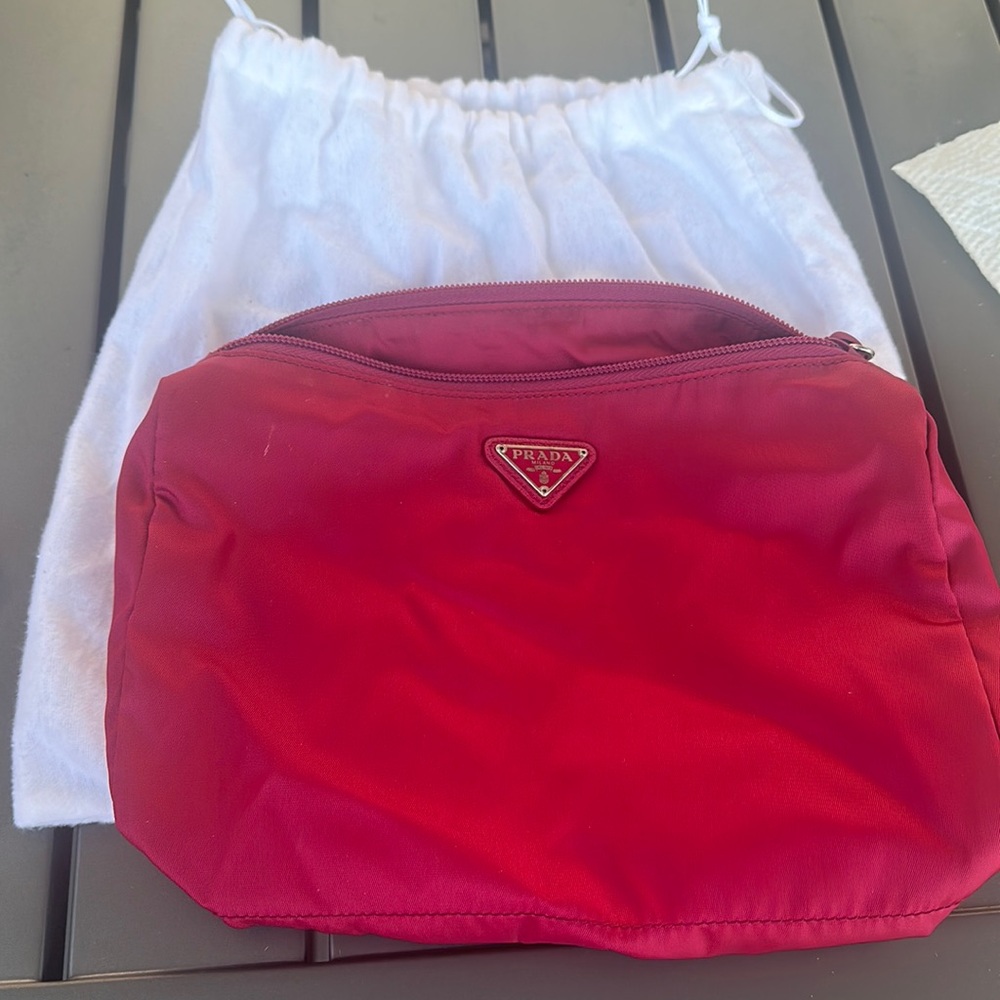 Prada makeup bag! With dust bag in a beautiful berry color
